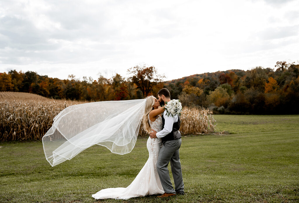 Bride and Groom Kissing in their fall wedding in Pittsburgh