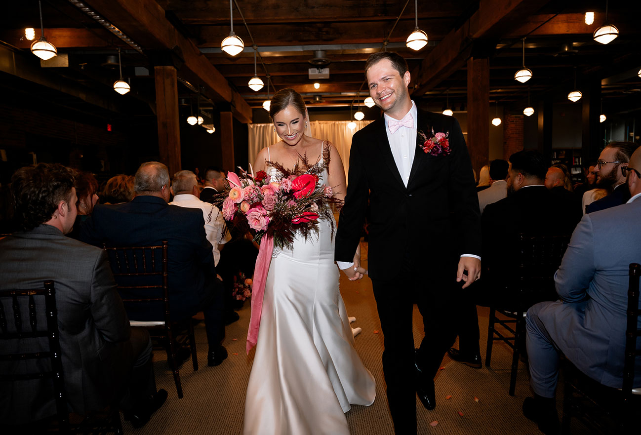 Bride and Groom Walking out from Ceremony at Heinz History Center