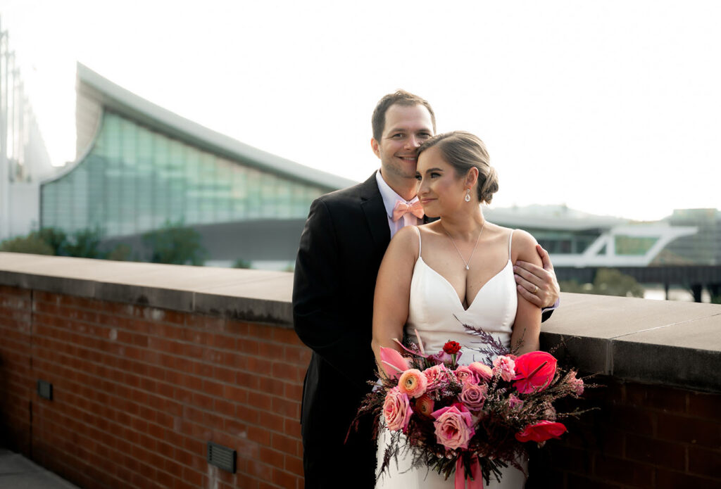 Bride and Groom outside of Heinz with Pittsburgh in the background