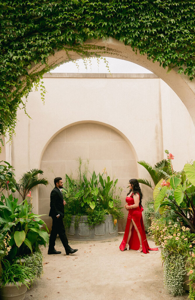 Bride and groom walking towards each other at Longwood Gardens