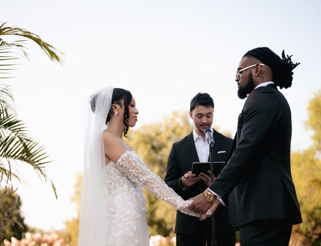 Bride and Groom Holding hands at Phipps Conservatory Wedding