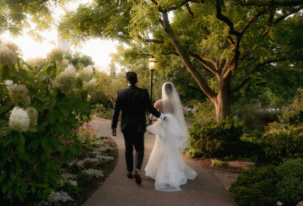 Bride and Groom walking after Phipps Conservatory Wedding