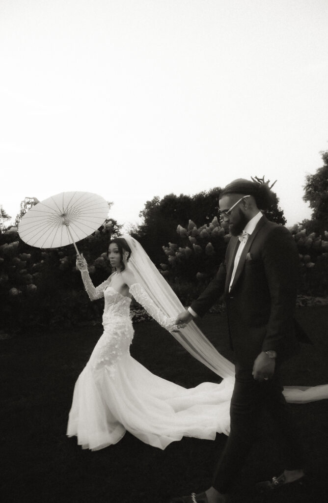 Elegant Bride and Groom walk at their wedding 