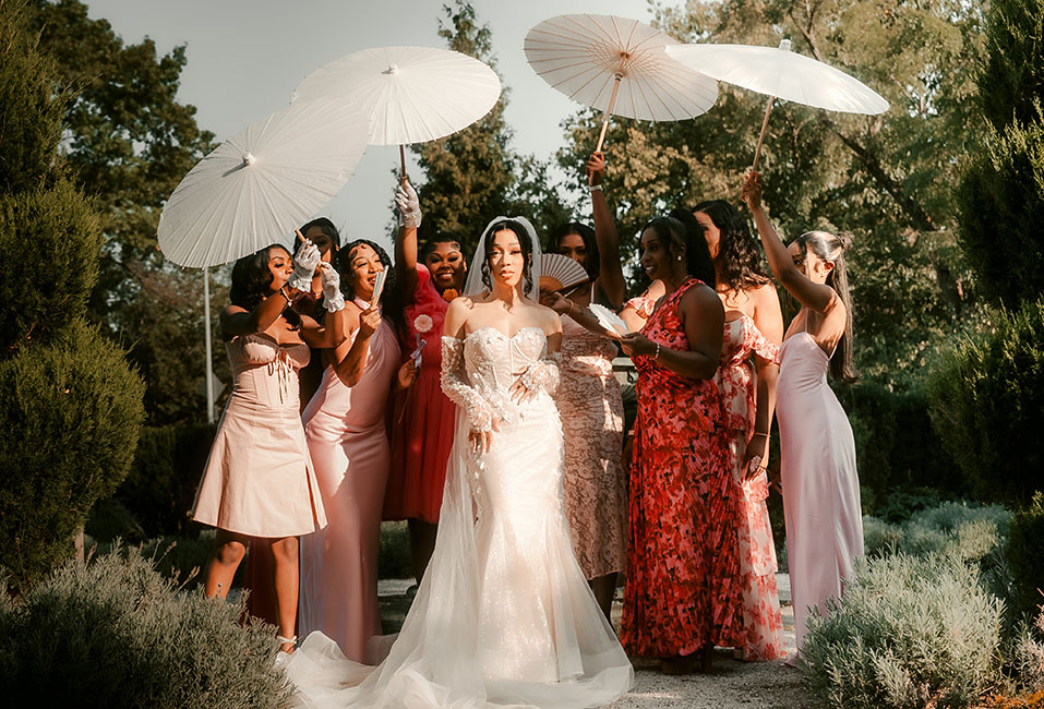 Bridesmaids holding Umbrellas at Phipps Wedding