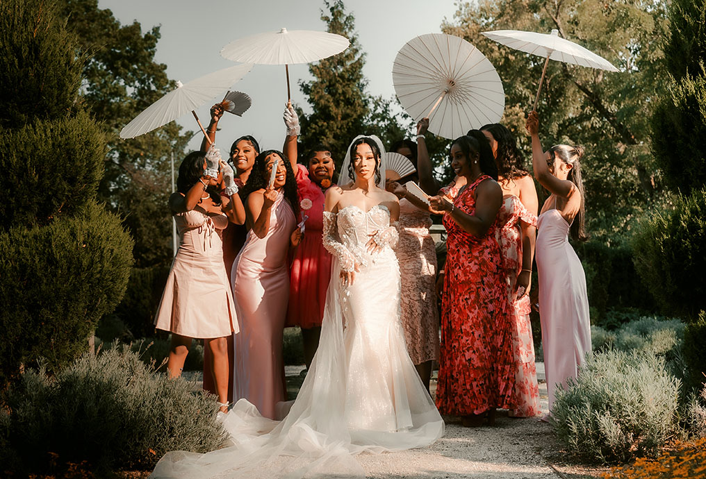 Bridesmaids holding Umbrellas at Phipps Wedding