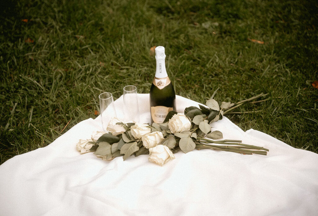 White roses with champagne glasses