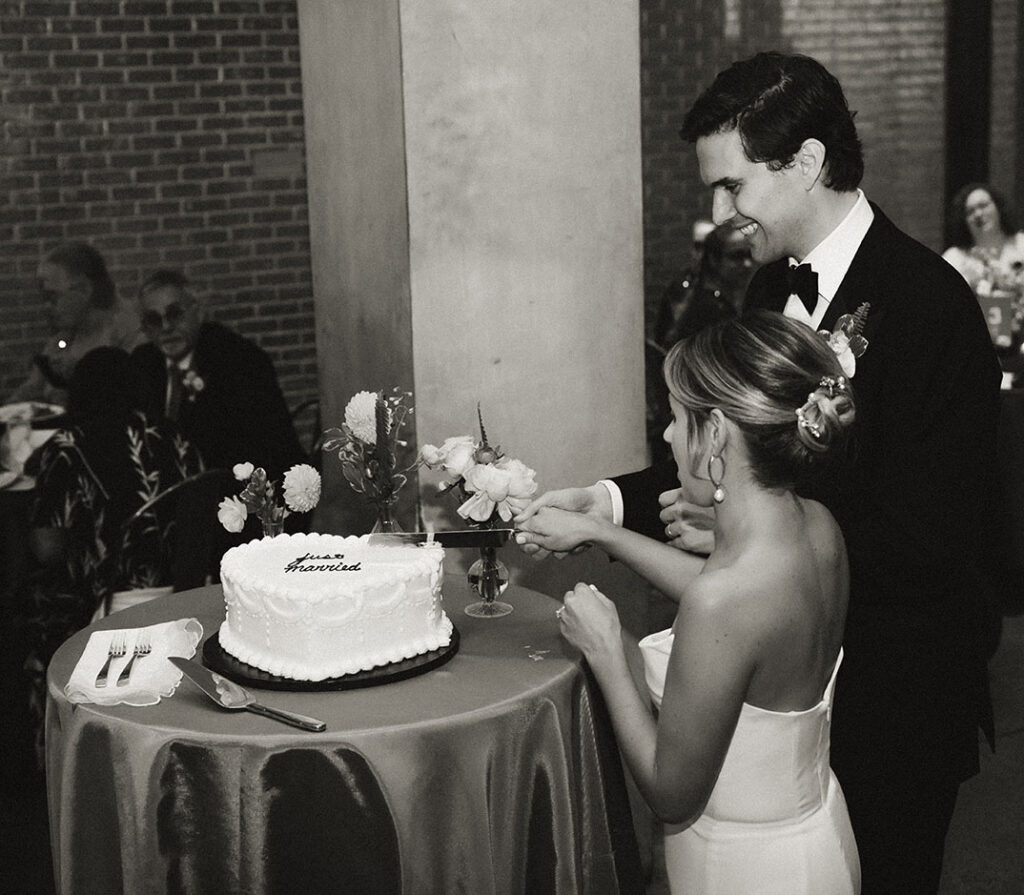 Couple Cut Cake at Andy Warhol Museum Wedding in Pittsburgh