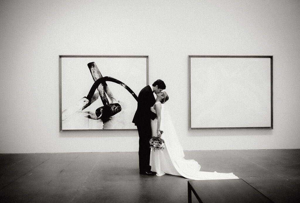 Bride and Groom kiss at  their Andy Warhol Wedding