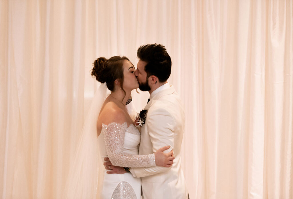 Bride and Groom kiss at Wedding Ceremony in Pittsburgh