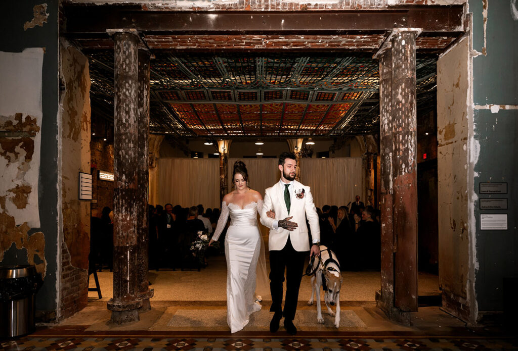 Bride and Groom with dog at their Museum Lab Wedding 