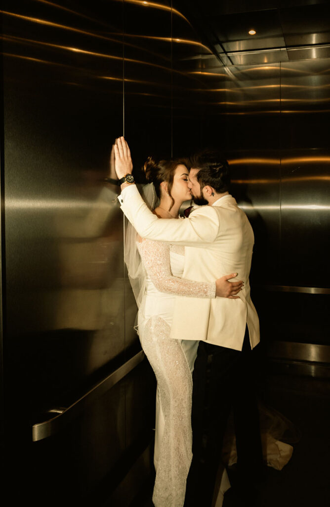 Bride and Groom in the elevator at Museum Lab Wedding