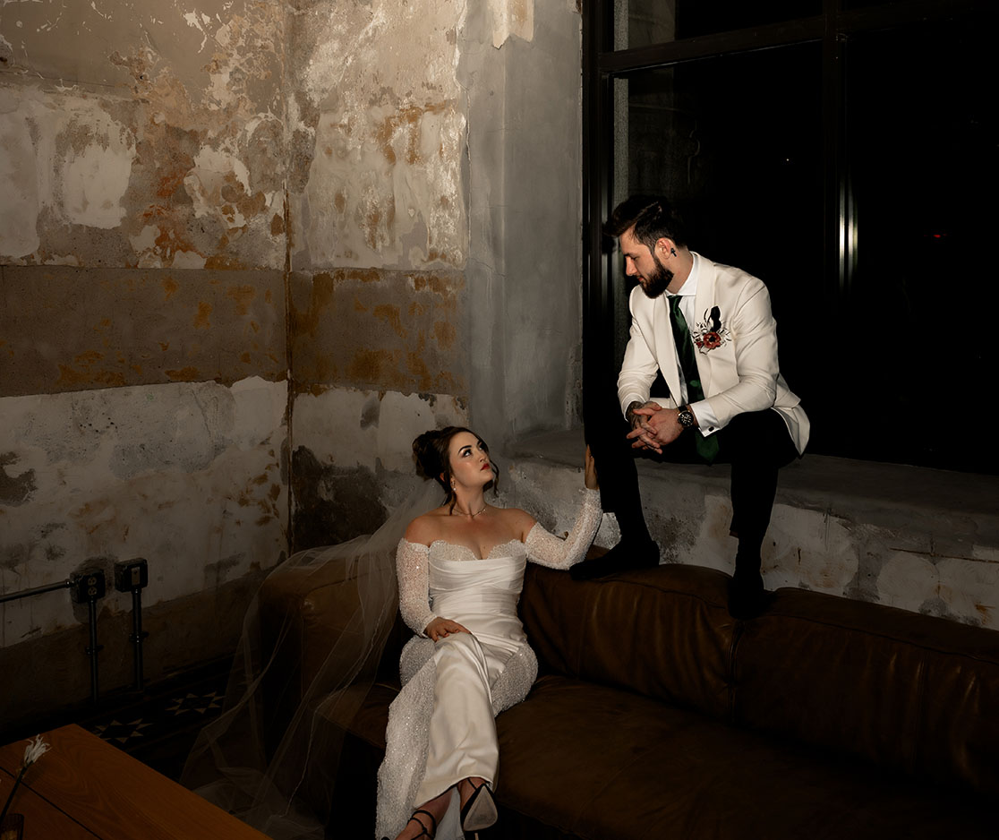 Bride and Groom sitting at Museum Lab Wedding