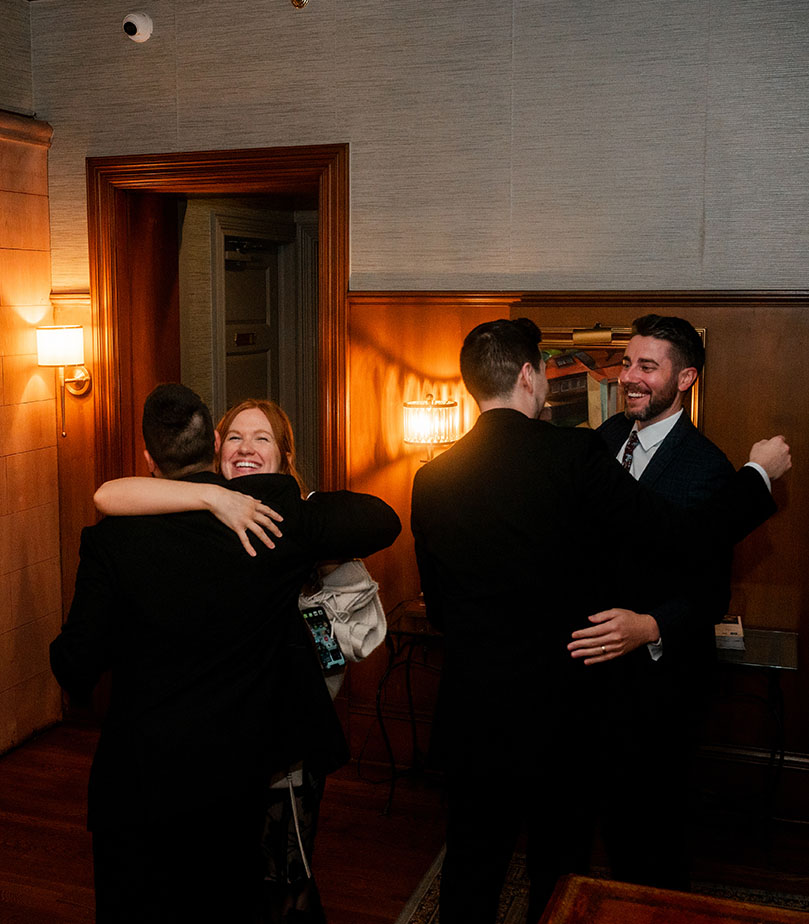 Friends and Family Hug at Shelby Club Wedding