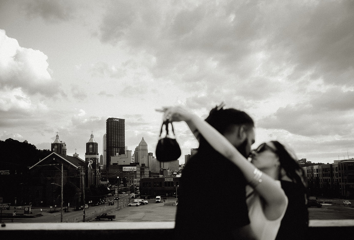 Couple Kiss with city in the background