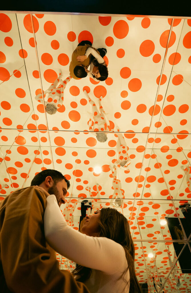 Couple's reflection at Mattress Factory Museum's mirror