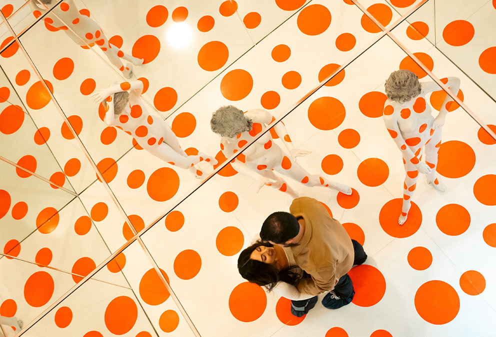 Couple's reflection at Mattress Factory Museum's mirror