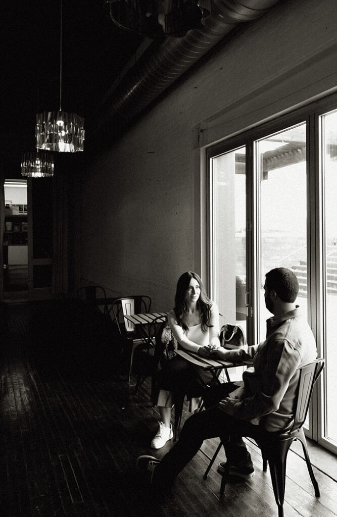 Couple Sitting at Mattress Factory Museum Lobby holding hands