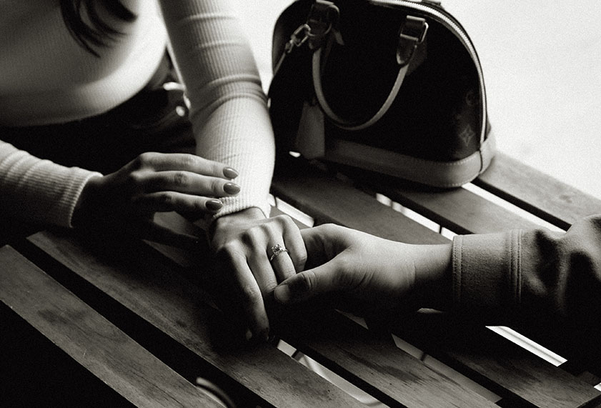 Engaged Couple Holding Hands