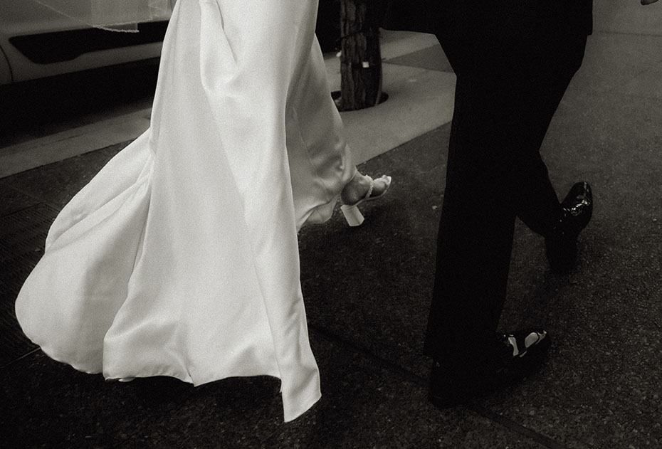 Bride and Groom walking in Downtown