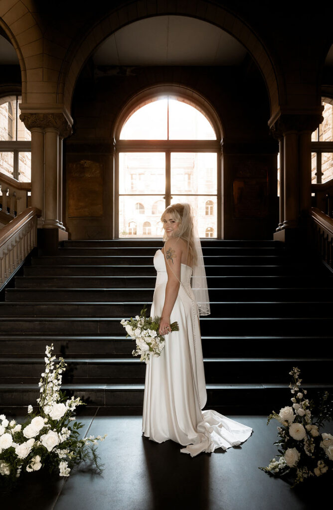 Bride holding bouquet at Allegheny County Courthouse