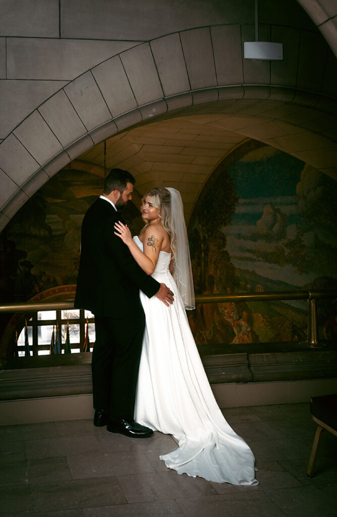 Bride and Groom embracing at the Downtown Wedding