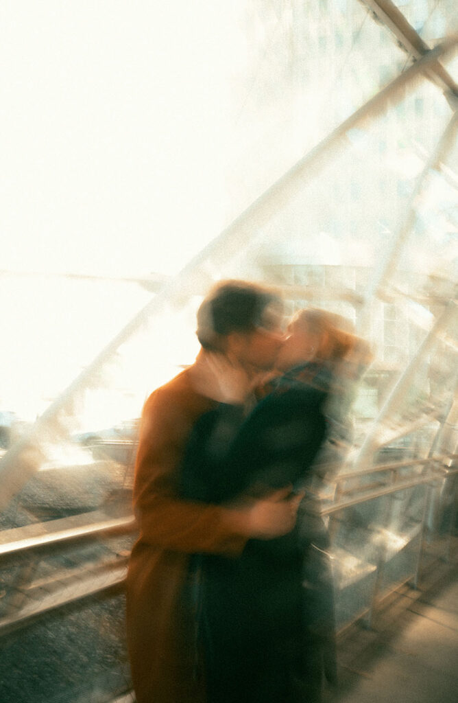 Blurry couple kissing at Pittsburgh Downtown Station