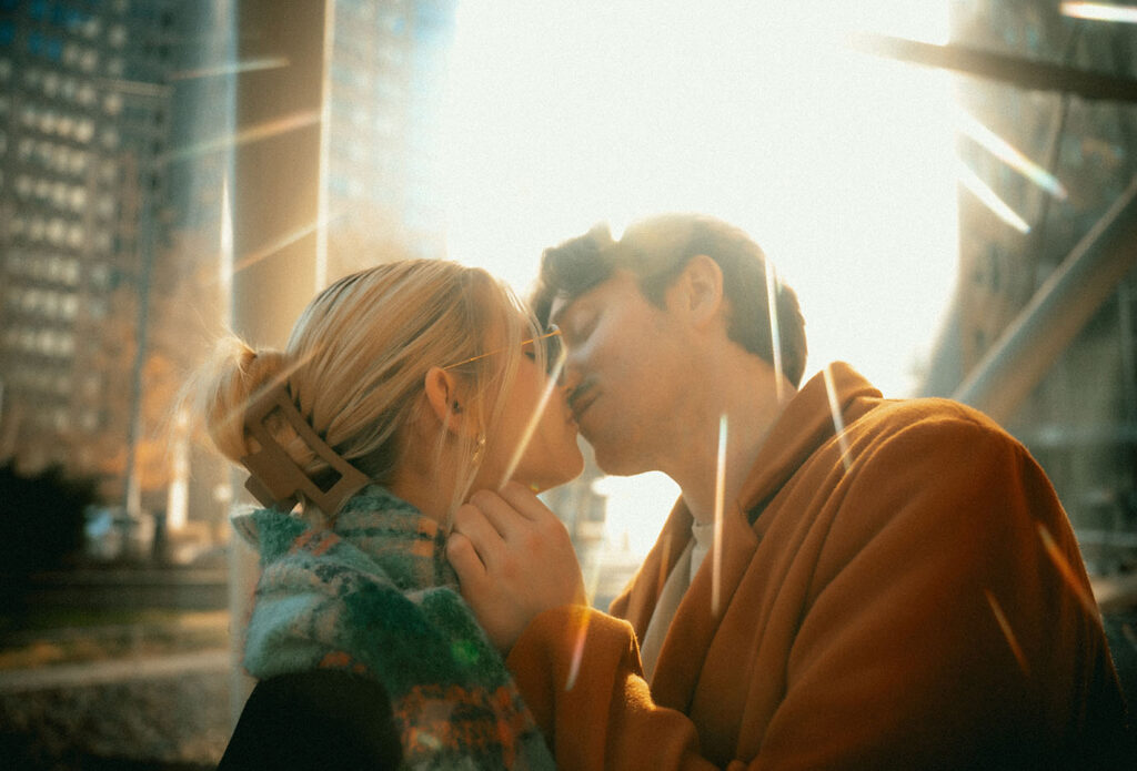 Couple About to kiss during engagement in Pittsburgh's Subway Station