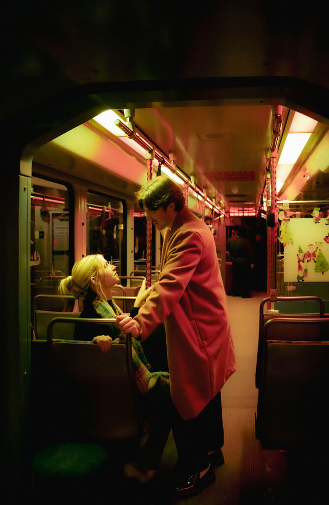 Couple facing each other at Subway train in Pittsburgh