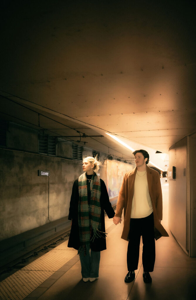 Couple Hold hands at Pittsburgh Subway Station