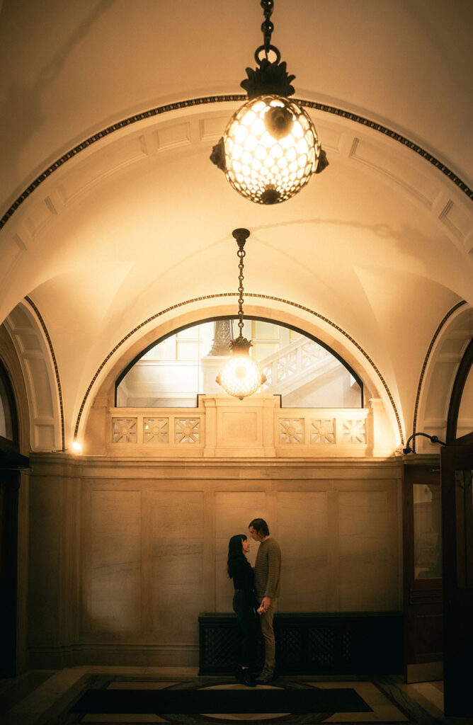 Couple stand at Carnegie Main Entrance