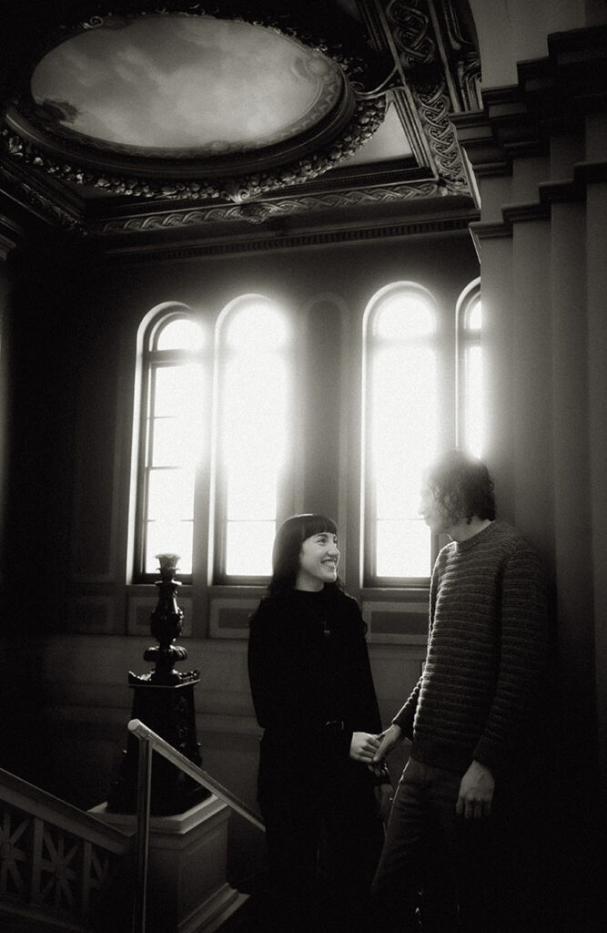 Couple holding hands at Carnegie Library