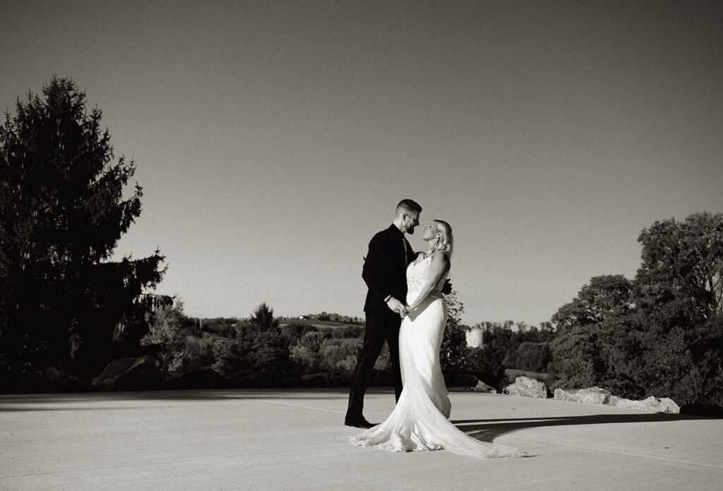 BW Bride and groom looking at each other at Yinzer valley farms hill