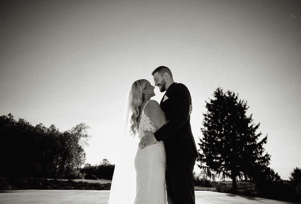 BW Bride and groom looking at each other at Yinzer valley farms hill