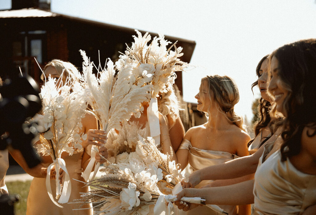 Bridesmaids holding their flowers