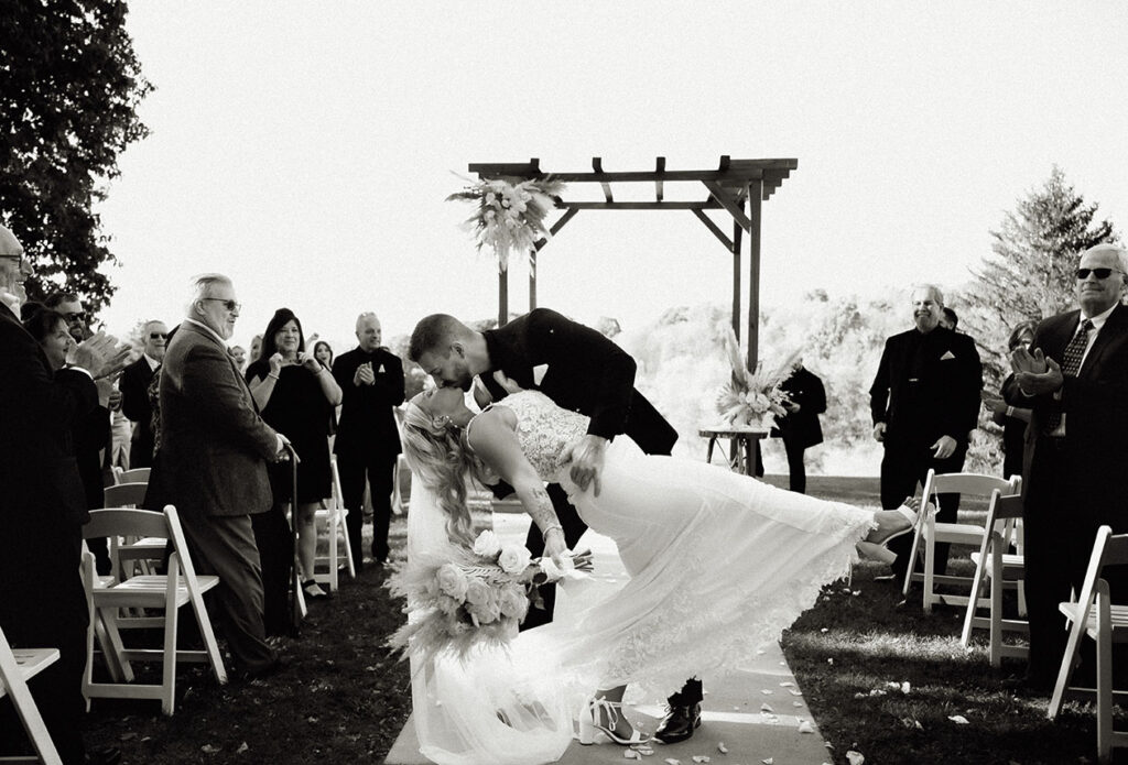 Bride and Groom Deep at the altar of their wedding ceremony at yinzer valley farms