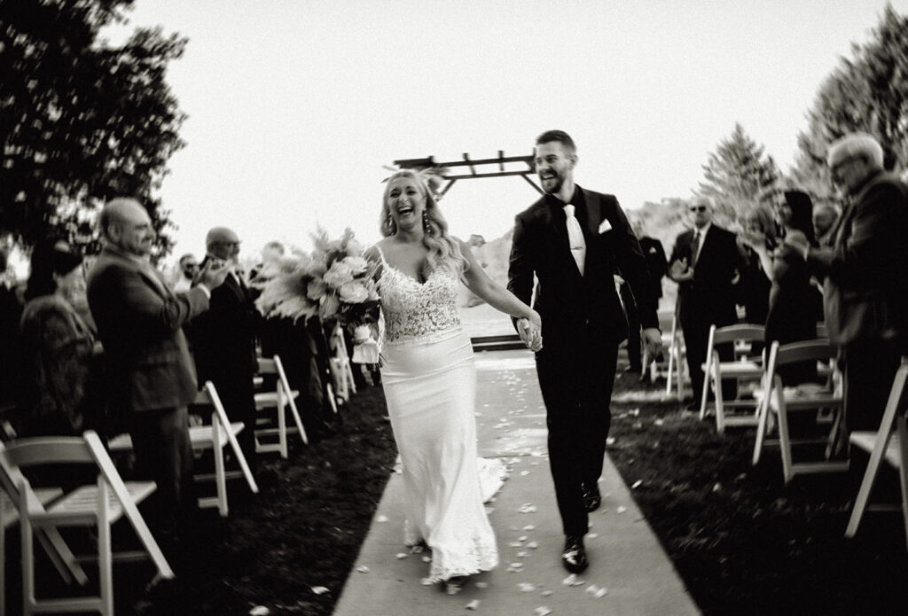 Bride and Groom Exit their Wedding Ceremony at yinzer valley farms