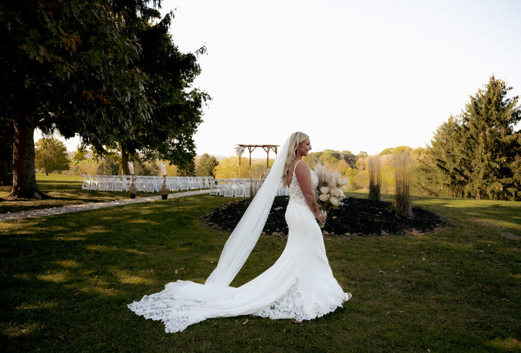 Bride walking across yinzer valley farms