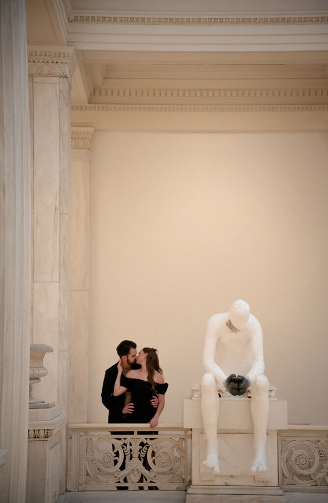 Couple kissing at their engagement at Carnegie Museum of art