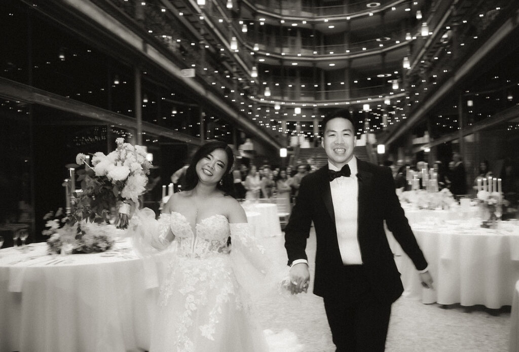 BW Bride and Groom Walking down the isle