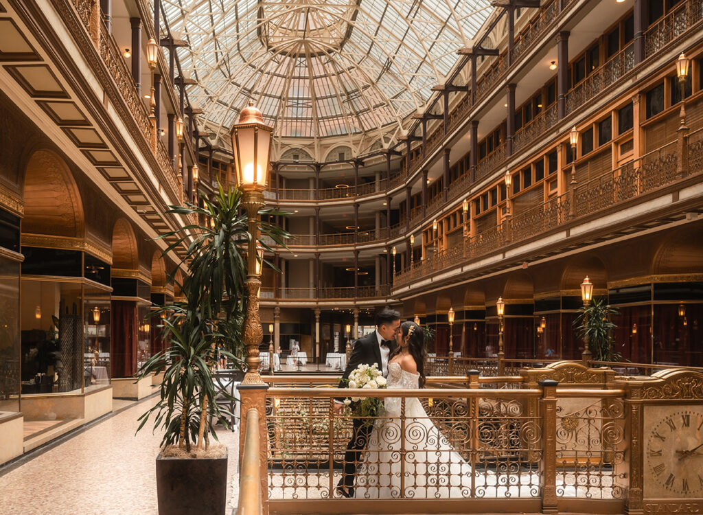 Bride walks towards Groom during First Look at the Arcade Wedding in Cleveland