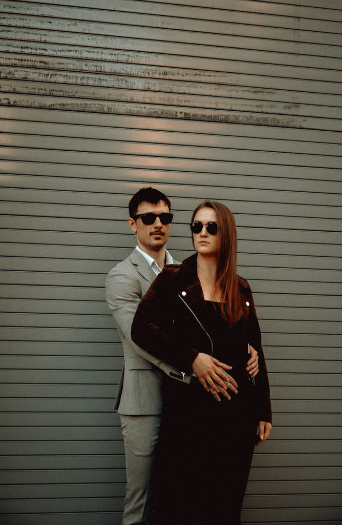 Couple in the Strip District wearing sunglasses