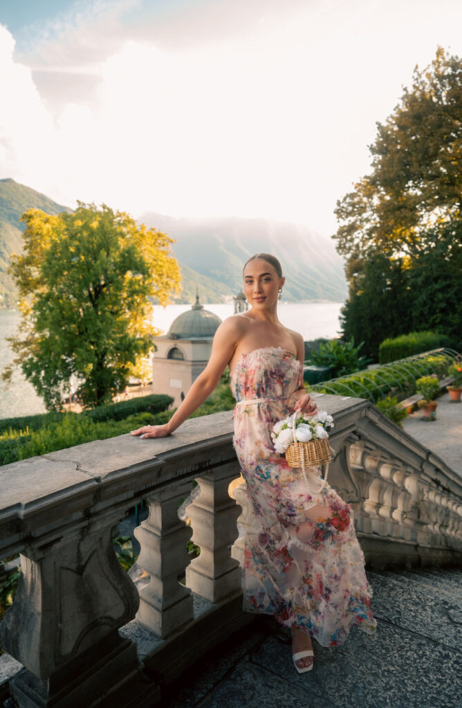 Young Woman in front of green plants at Villa Carlotta in Lake Como