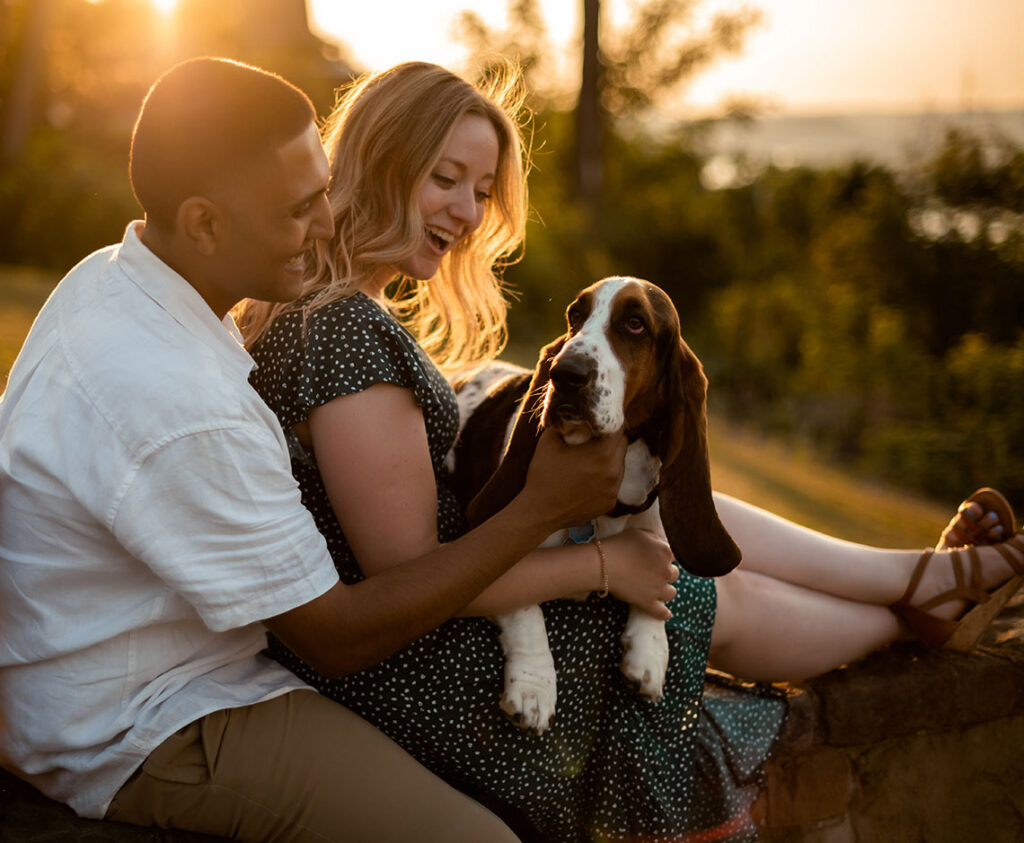 Couple with dog during engagement