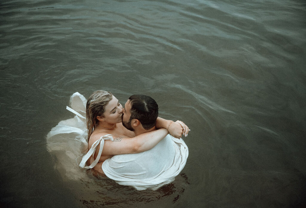 Couple in water at Moraine Park Engagement