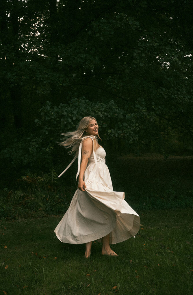 Bride to be showing off her white dress at Moraine Park