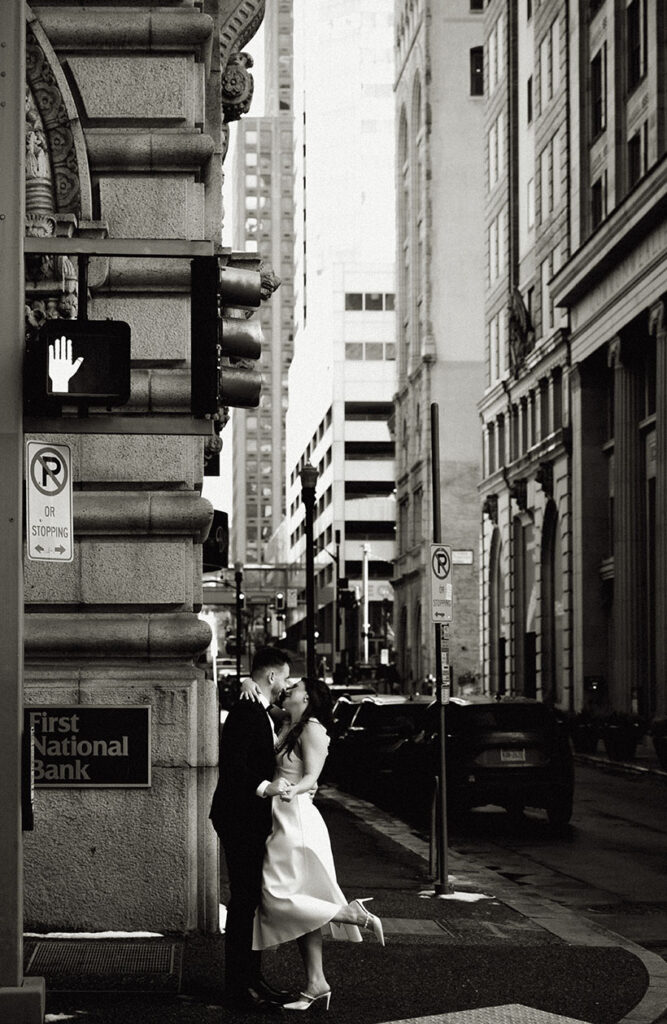 Couple kissing in City Engagement in Downtown Pittsburgh