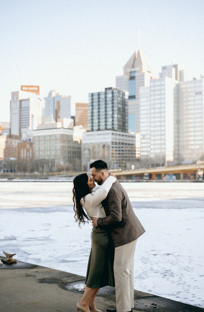 Couple holding hands in Pittsburgh's North Shore