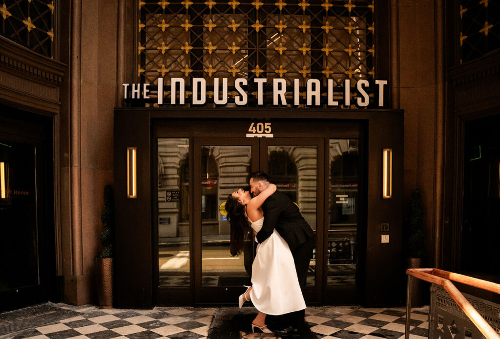 Vintage glamour engagement photos at The Industrialist Hotel with cinematic Old Hollywood style