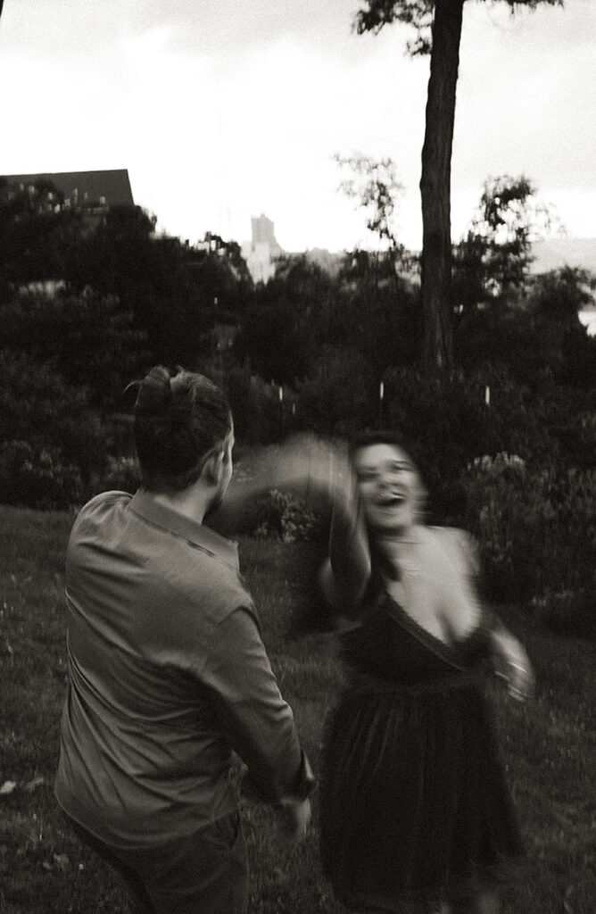 Couple being playful in their anniversary photo shoot