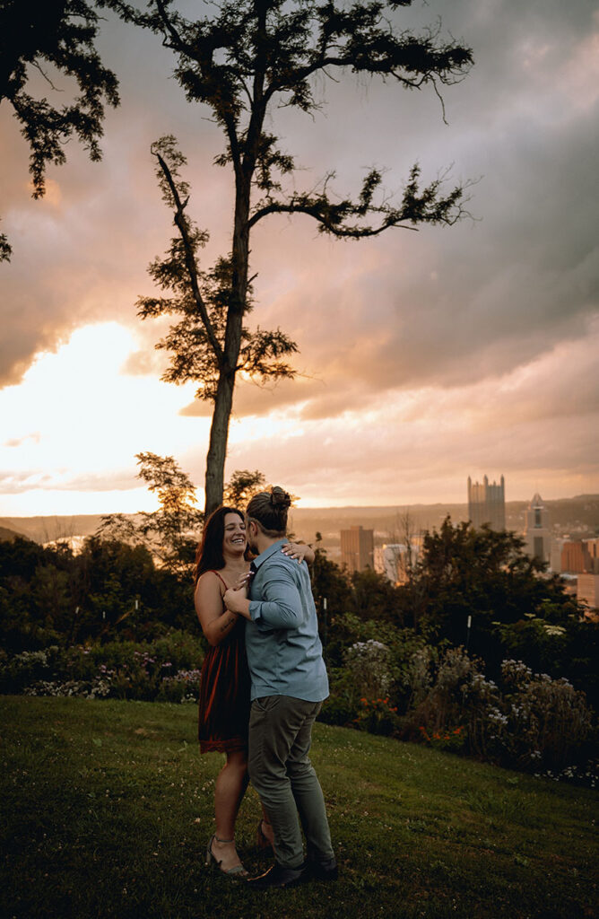 Couple dance as they celebrate their anniversary by having photos in Emerald Park